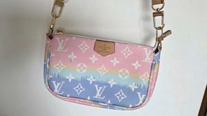 Used Louis Vuitton inspired bag with a coin purse