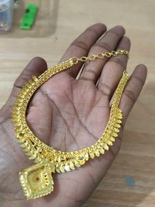 Elegant Gold Necklace with Red &amp; Green Stones