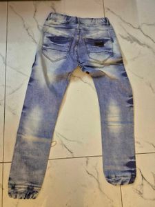 Distressed Light Wash Denim Jeans/Joggers