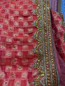Beautiful Orange Saree with Gold Embellishments