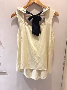 Chic Cream Ruffled Top with Bow Detail