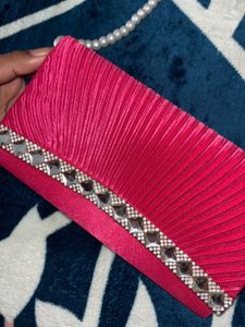Elegant Pink Clutch with Pearl Strap