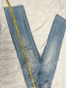 washed out distressed Blue baggy Jeans
