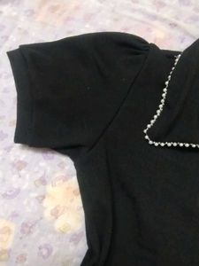 Chic Black Polo Top with Pearl Collar