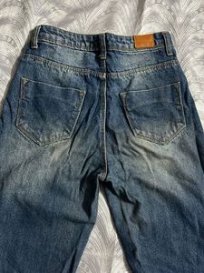 Distressed Wide-Leg Jeans