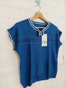 Stylish Blue Top with White Accents