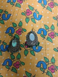Elegant Ethnic Earrings with Green Accents