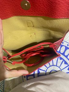 Red Ring Handle Clutch