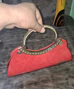 Elegant Coral Clutch Bag with Crystal Handle