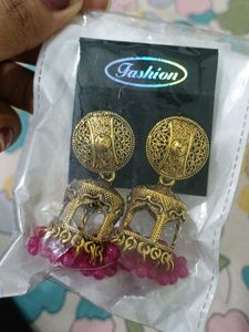 Elegant Gold Tone Jhumka Earrings with Pink Beads