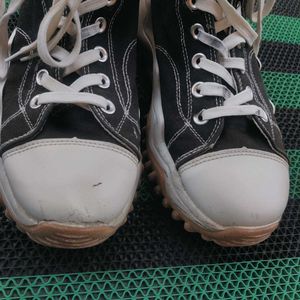 Converse High-Top Sneakers.
