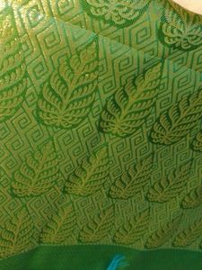 Elegant Green Saree with Gold Leaf Motifs