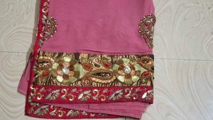 Elegant Pink Saree with Intricate Embellishments