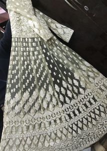 Party Wear Lehnga With Embroided Long Jacket.