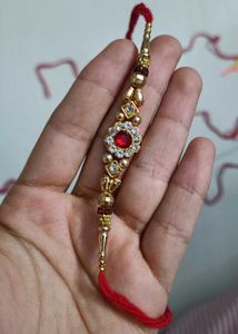 Elegant Rakhi with Red Stone