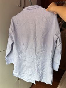 Light Blue Collared Button-Up Shirt