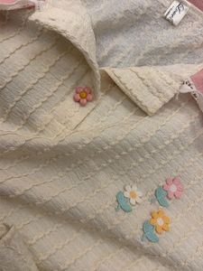 Cute Cream Textured tshirt with Pink Collar