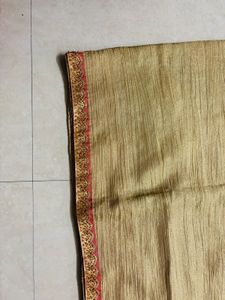 Elegant Gold Saree with Pink Border