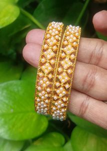 Elegant Gold Bangles with Pearl Accents