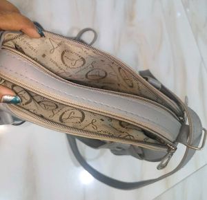 Grey sling bag