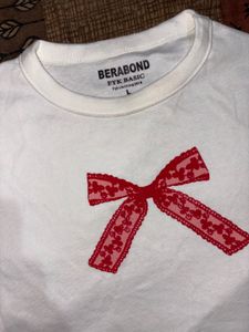 White T-Shirt with Red Bow Detail