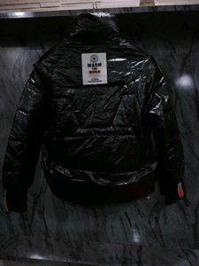 Chic Black Puffer Jacket with Orange Accents