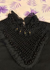 Elegant Black Blouse with Beaded Neckline