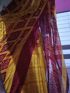 red and yellow saree