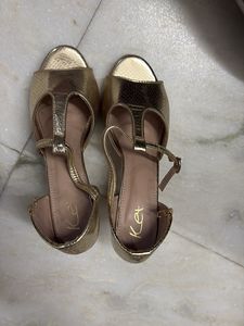 Stylish Gold T-Strap Heels