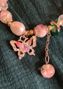 Sparkling Pink Beaded Bracelet with Butterfly Char
