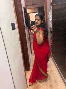 Elegant Red Saree with Golden Border