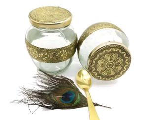 Vintage Glass Jars with Ornate Lids