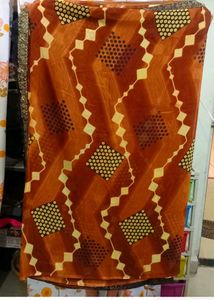 Beautiful Orange Saree with Unique Print