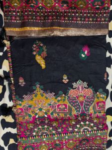Elegant Black Saree with Intricate Peacock Motifs