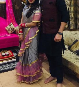 Elegant Grey Saree with Pink Ruffle Border