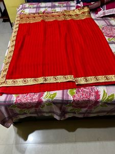 Elegant Red Saree with Golden Border