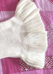 Cream Knit Shrug with Ruffle Sleeves