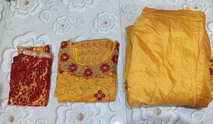 Yellow embroidered kurta sharara set