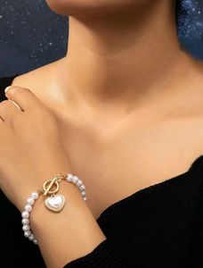 Pearl Bracelet with Heart Charm (2 rings free)