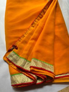 Vibrant Yellow Saree with Golden Border