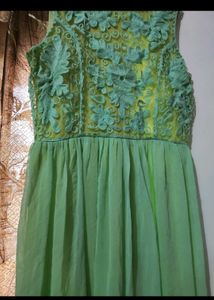 Elegant Green Maxi Dress with Floral Detail