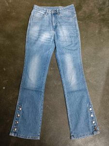 Women's Light Wash Flare Jeans with Button Detail
