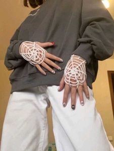 Spider-web crochet pullover