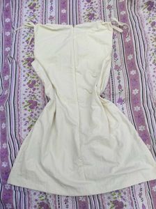 Cream Sleeveless Mini Dress with pockets