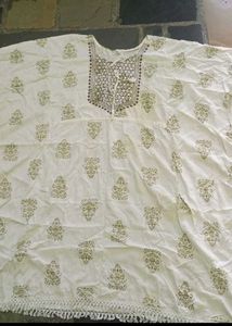 Elegant Cream Kurta Set with Tassels