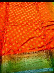 Vibrant Orange Silk Saree with Green Border