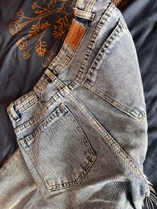 Ripped Light Wash Denim Jeans