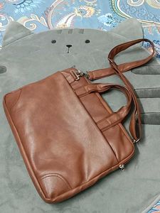 👜