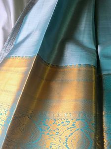 Exquisite Grey Silk Saree with Gold Border