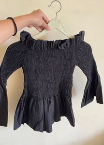 Black Off-Shoulder Smocked Peplum Top